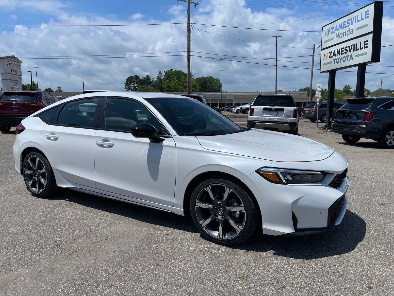 2026 Honda Civic Hatchback FWD Touring Hybrid