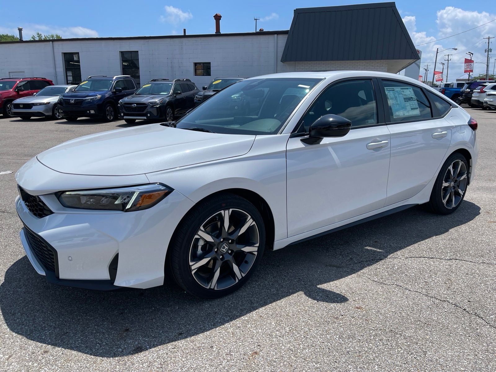 2026 Honda Civic Hatchback FWD Touring Hybrid