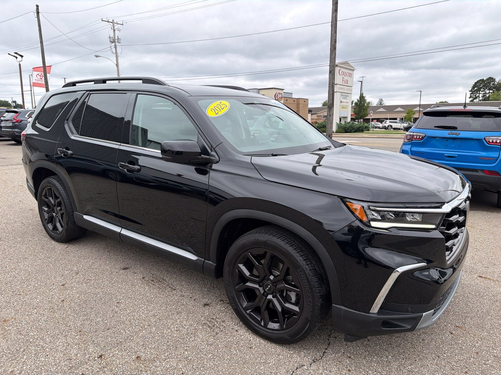 2025 Honda Pilot Touring+ - Photo 1