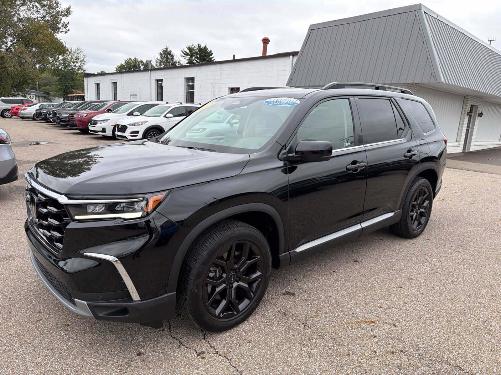 2025 Honda Pilot Touring+ - Photo 3